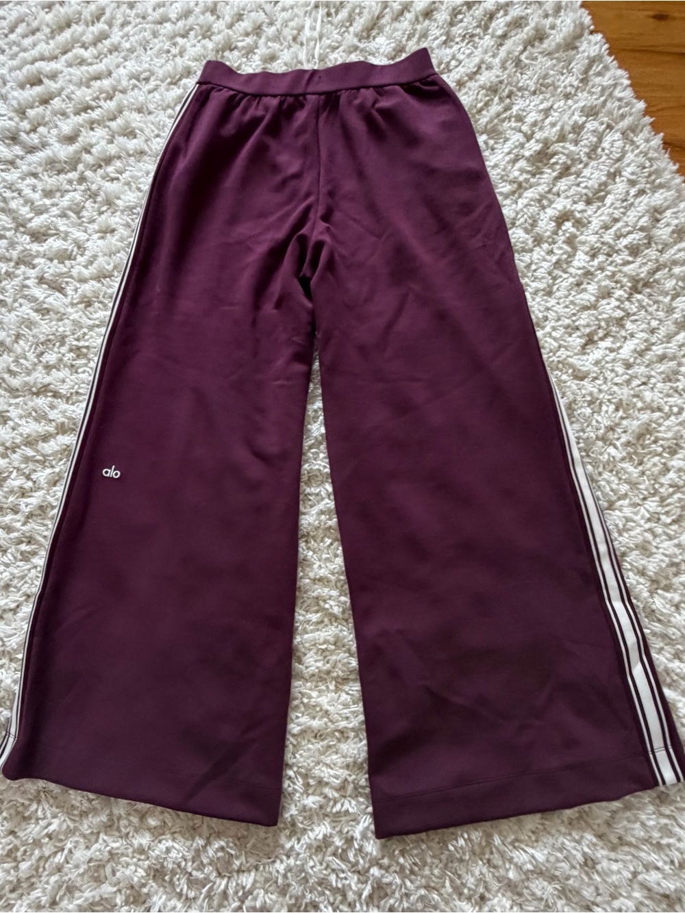 ALO Yoga Wide-Leg Track Pants in Plum with White Side Stripes - Picture 8 of 10